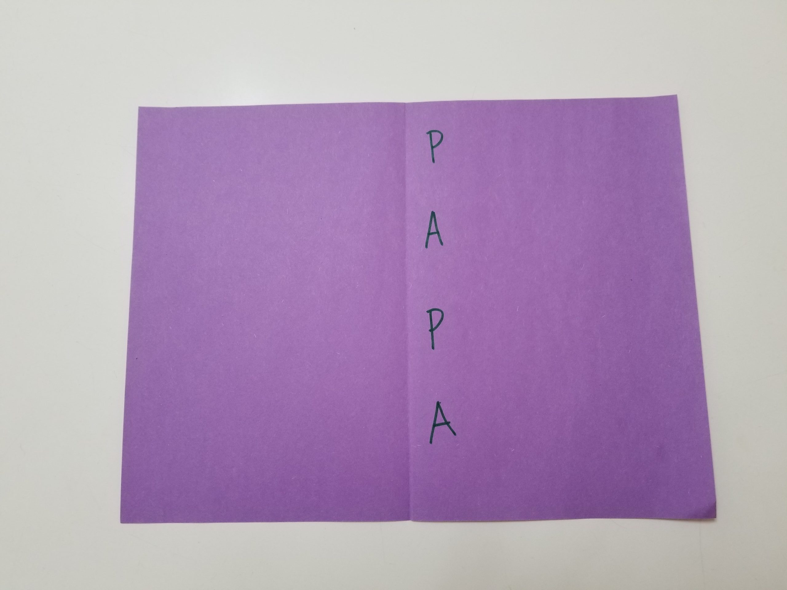 purple sheet of paper