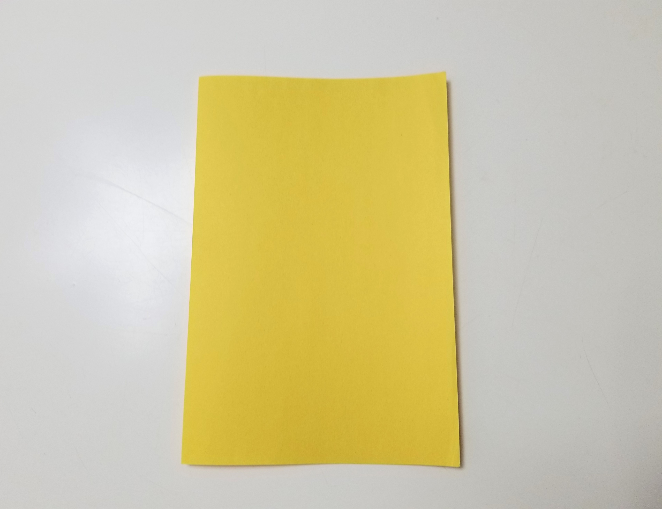 yellow sheet of paper