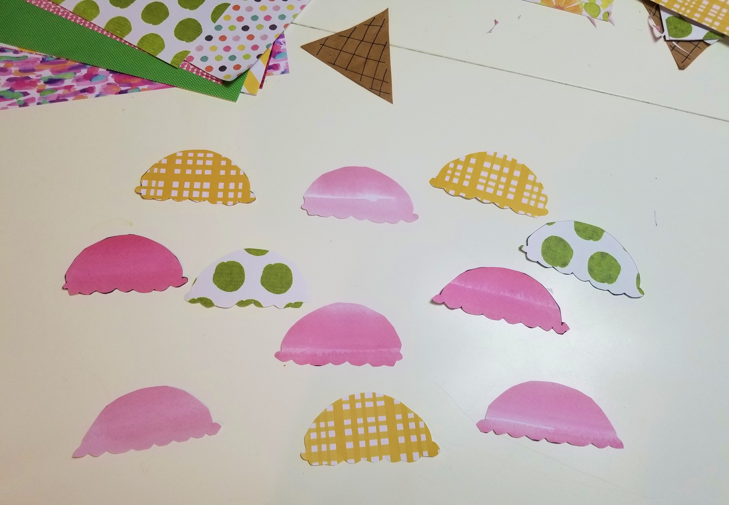 Ice cream scoops cut out of patterned craft paper