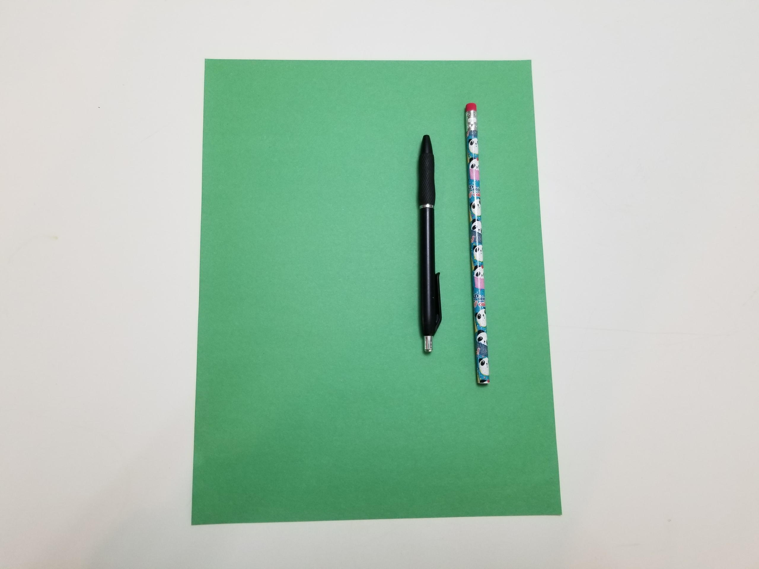 Construction paper, pencil, pen
