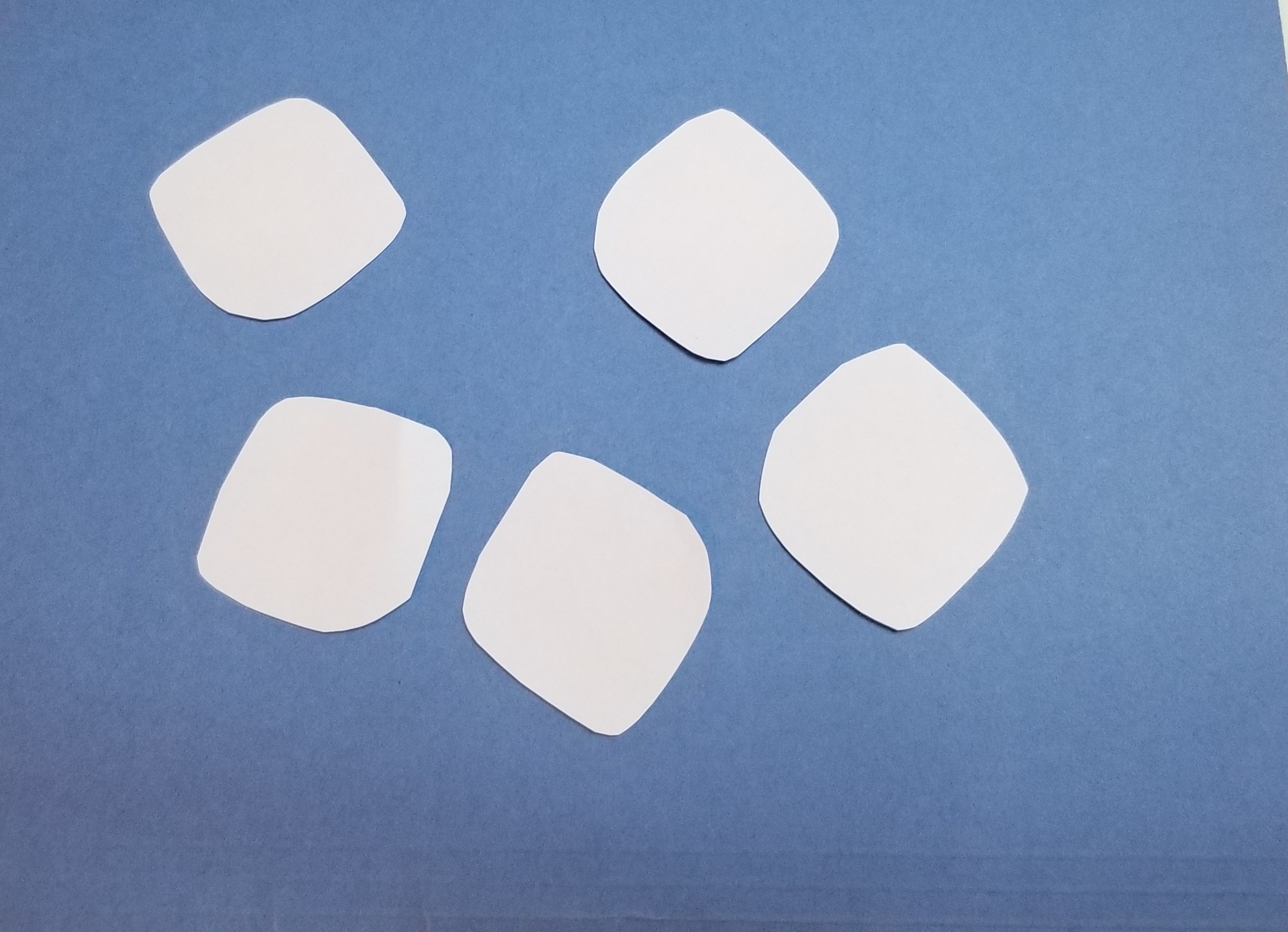 pretend marshmallows cut out of white paper