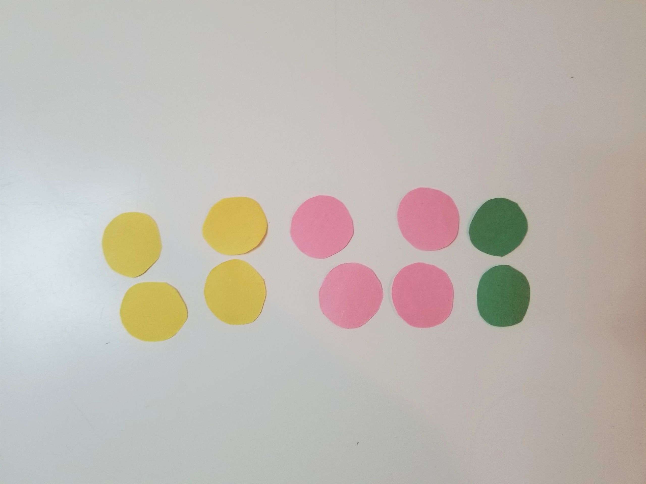 Circles cut out of colorful paper