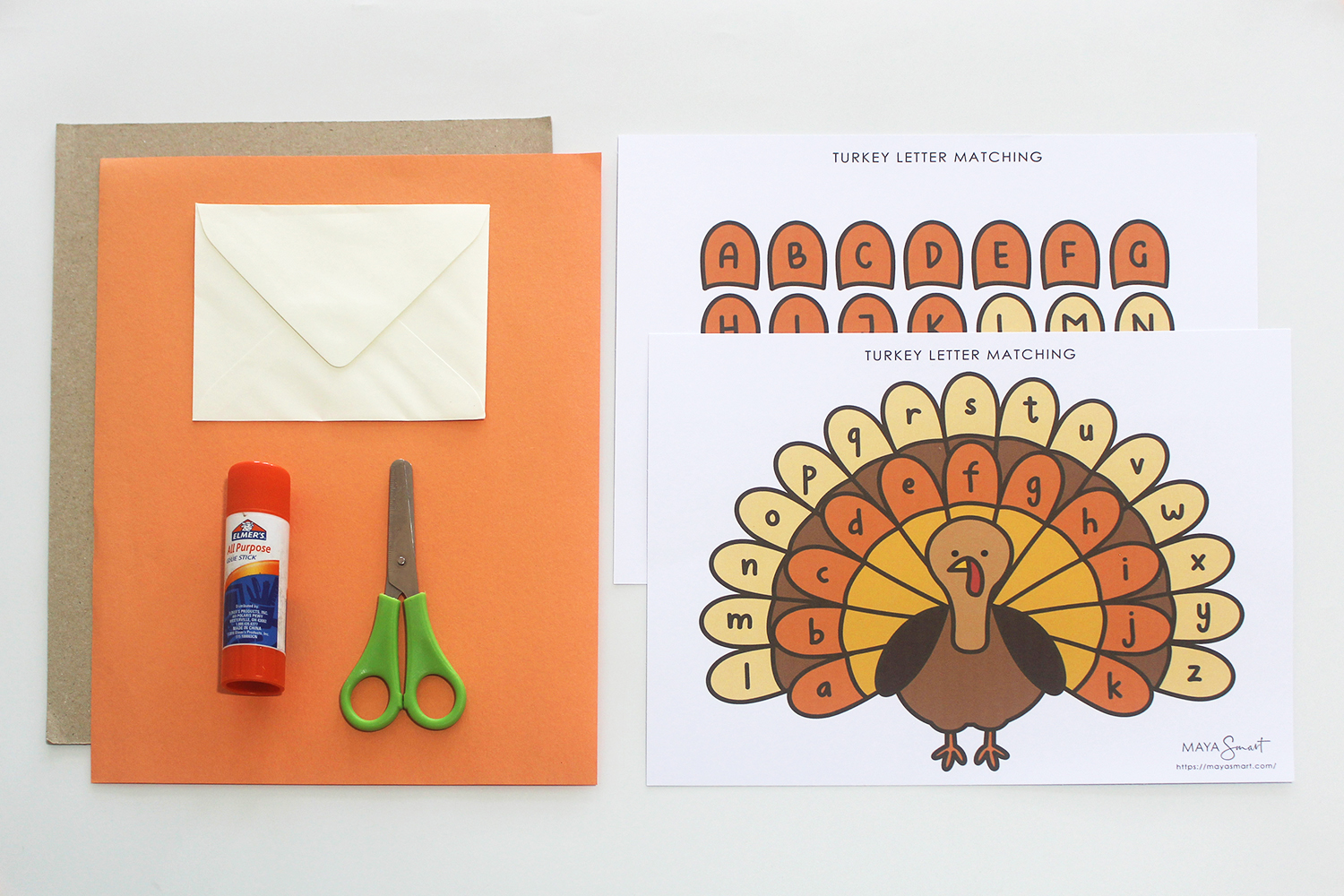 Construction paper, scissors, glue, envelope, turkey letter matching printable