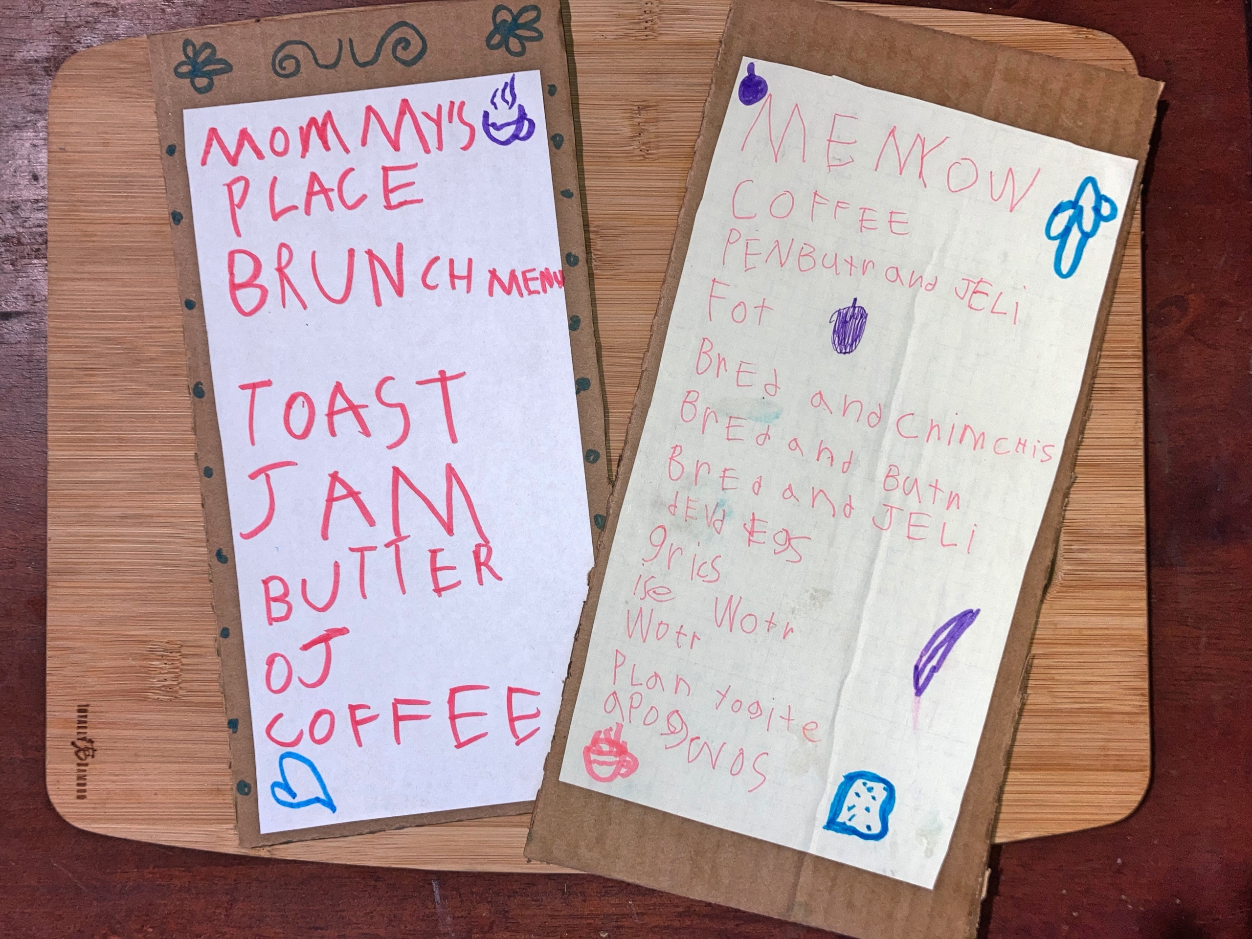 two Mother's Day brunch menus written in a child's handwriting 